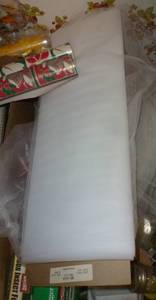 Bolt of netting and some wrapping paper