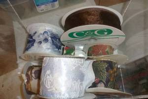 acrylic container of ribbon and mesh netting