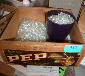 vintage crate and a bunch of glass stones