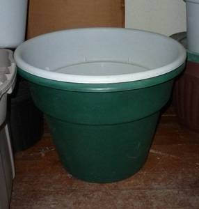 Two 22 inch dia x 17 tall plastic planters