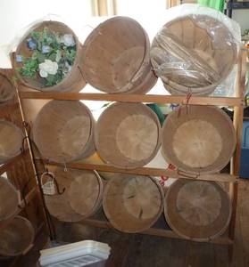 wood display that holds 9 bigger baskets for silk flowers, apples, whatever