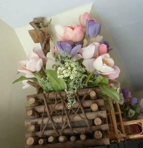 spring flower arrangement and birdcage look for flowers