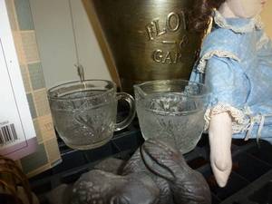 wind spinner, metal planter, doll, doilies, vintage glass cups