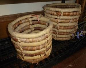 2 baskets and a wall hanging