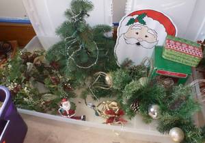 Holiday greenery baskets and wall hangings
