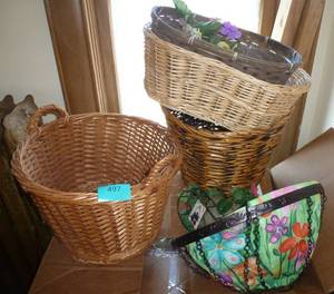 4 wicker baskets and one colorful hanging basket