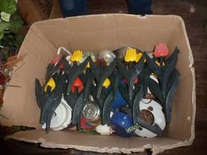 Box of plastic tulip fence and homemade bird houses