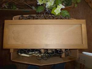 Box of wood frames with ornate iron
