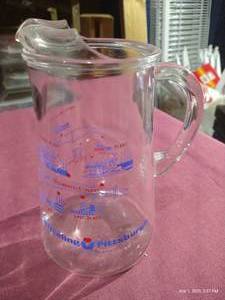 lot 145 image: Vintage Wheeling Pittsburgh Steel Corporation Glass Pitcher