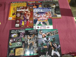 lot 189 image: (8) Sports Magazines - Sioux Programs, Beckett, League Championship Program