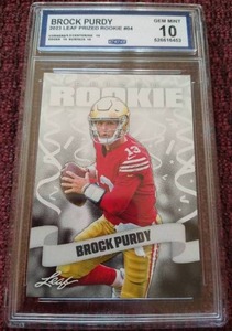 lot 197 image: 2023 Leaf Brock Purdy Rookie Card - CCG 10