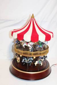 lot 87 image: Decorative Musical Carousel with Lights and Rotating Horses