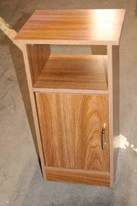 lot 102 image: Compact Wooden Cabinet with Single Door and Open Shelf