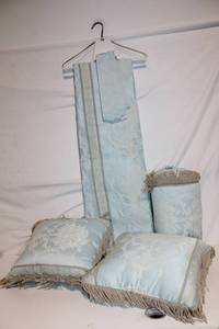 lot 156 image: Elegant Pale Blue Jacquard Pillow and Curtain Set with Fringe