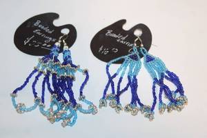 lot 438 image: Pair of Beaded Handmade Earrings - Blue and Silver Tones