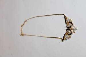 lot 445 image: Elegant Gold Tone Necklace with Black Enamel and Crystal Accents