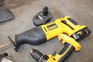 lot 16 image: Dewalt Cordless Tool Set with Reciprocating Saw, Drill, Flashlight, Charger, and Two Batteries