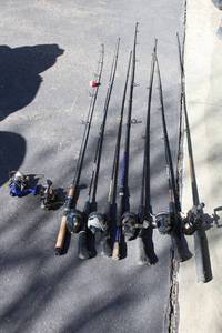 lot 57 image: Set of 9 Fishing Rods and Reels with Various Brands and Sizes