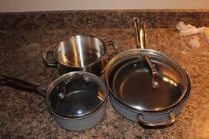 lot 75 image: Set of Cuisinart Stainless Steel Cookware with Glass Lids
