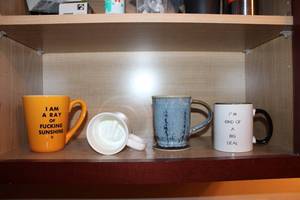 lot 82 image: Set of 4 Humorous Ceramic Mugs with Unique Designs