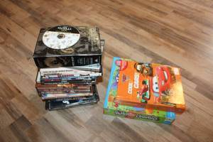 lot 112 image: Collection of DVDs and Childrens Games including James Bond and Cars