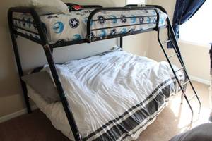 lot 117 image: Space-Themed Twin Over Full Metal Bunk Bed with Ladder