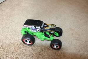 lot 134 image: Grave Digger Monster Jam Toy Truck with Articulating Wheels