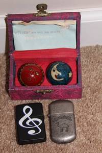 lot 147 image: Set of Health Exercise Iron Balls with Vintage Lighters