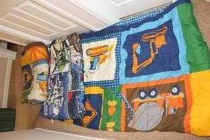 lot 152 image: Set of 2 Childrens Themed Quilts - Construction and Star Wars Designs