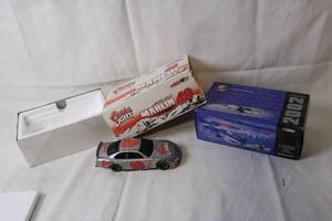 lot 100 image: 2002 Coors Light #40 NASCAR Diecast Car with Original Packaging