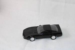lot 186 image: 124 Scale Black Diecast Model Car