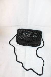 lot 192 image: Vintage Black Beaded Evening Bag with Snap Closure