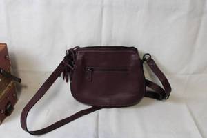 lot 193 image: La Diva Burgundy Leather Crossbody Bag
