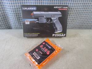 (EC1) Pistol Airsoft Gun and Bag of...