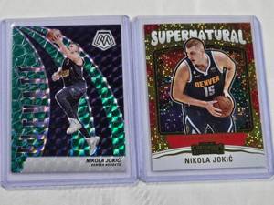lot 99 image: Lot of 2 Nikola Jokic Cards - 2023-24 Panini Mosaic No. 5 and 2023 Panini Contenders Supernatural No. 16