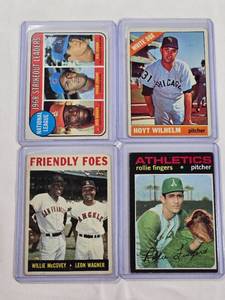 lot 149 image: Lot of 4 Vintage Topps Baseball Cards - Rollie Fingers, Hoyt Wilhelm, 1968 National League Strikeout Leaders, Friendly Foes - Willie McCovey & Leon Wagner