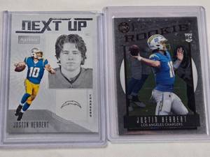 lot 216 image: Lot of 2 Justin Herbert Rookie Cards - Panni Chronicles Legacy No. 203, Panini Playbook Next Up No. NU-3