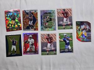 lot 229 image: Lot of 9 NFL Trading Cards Featuring Star Quarterbacks - Andrew Luck, Terry Bradshaw, Ben Roethlisberger, Deshaun Watson, Matt Ryan, Jake Haener