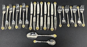 lot 43 image: Reed and Barton Golden Seafare Stainless Steel Flatware 188