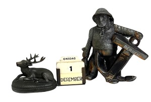lot 165 image: Vintage Metal Sitting Stag Calendar and Zero O.W.G. Figurine