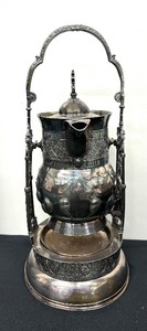 lot 90 image: Vintage Pelton Bros Tilting Water Vessel