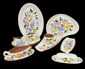 lot 110 image: Vintage Mid Century Stangl Pottery Fruit and Flowers Serving Platters, Butter Dish, Gravy Boat and More