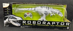 lot 108A image: WowWee Roboraptor - Interactive Robotic Dinosaur with Remote Control - New in Box