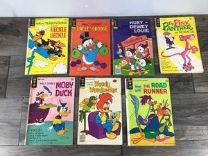lot 268 image: Lot of 7 Gold Key Comic Books - Woody Woodpecker - Moby Duck - The Road Runner - Heckle and Jeckle  - Uncle Scrooge - Huey Dewey & Louie - The Pink Panther