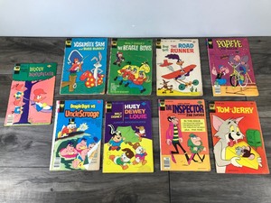 lot 275 image: Lot of 9 Whitman Comic Books - Beagle Boys - Woody Woodpecker - Huey Dewey and Louie - Pink Panther - Tom and Jerry - Yosemite Sam - The Road Runner - Popeye