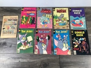 lot 279 image: Lot of 9 Whitman Comic Books - Tom & Jerry - Donald Duck - O Malley and the Alley Cats - Walt Disney Conics and Stories - Huey Dewey and Louie