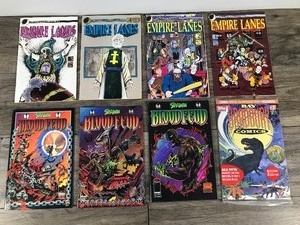 lot 281 image: Lot of 8 Comic Books - Spawn - Ray Bradbury - Empire Lanes