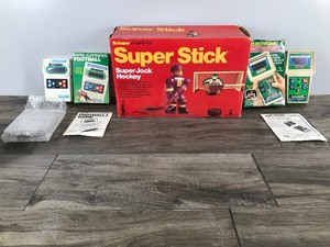 lot 365 image: Sports Games - Mattel Electronics Football Game - Electronic Quarterback Game - Schaper Super Jock Hockey Game