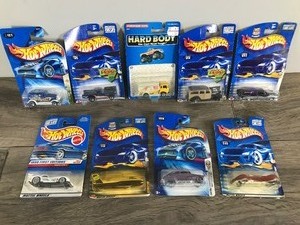 lot 396 image: Lot of 8 Hot Wheels Die Cast Cars in Original Packages & 1 Tootsie Toy Oil Truck