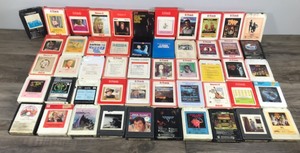 lot 401 image: Lot of 8 Track Music Tapes - KISS - Johnny Cash - Billy Joel - Dolly Parton - Black Sabbath - Elvis - Fleetwood Mac - Conway Twitty and More